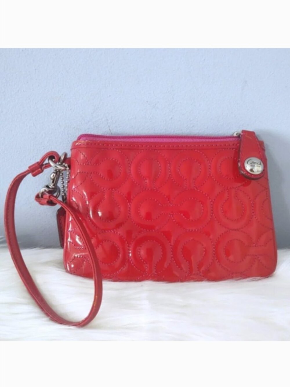 Coach embossed signature liquid gloss wristlet EUC